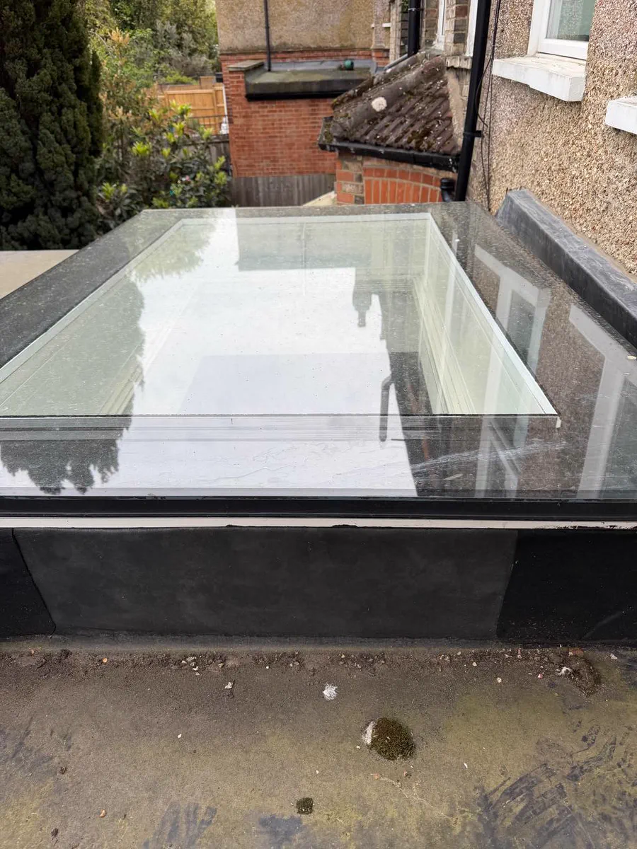 A clean glass roof lantern on a flat roof after cleaning